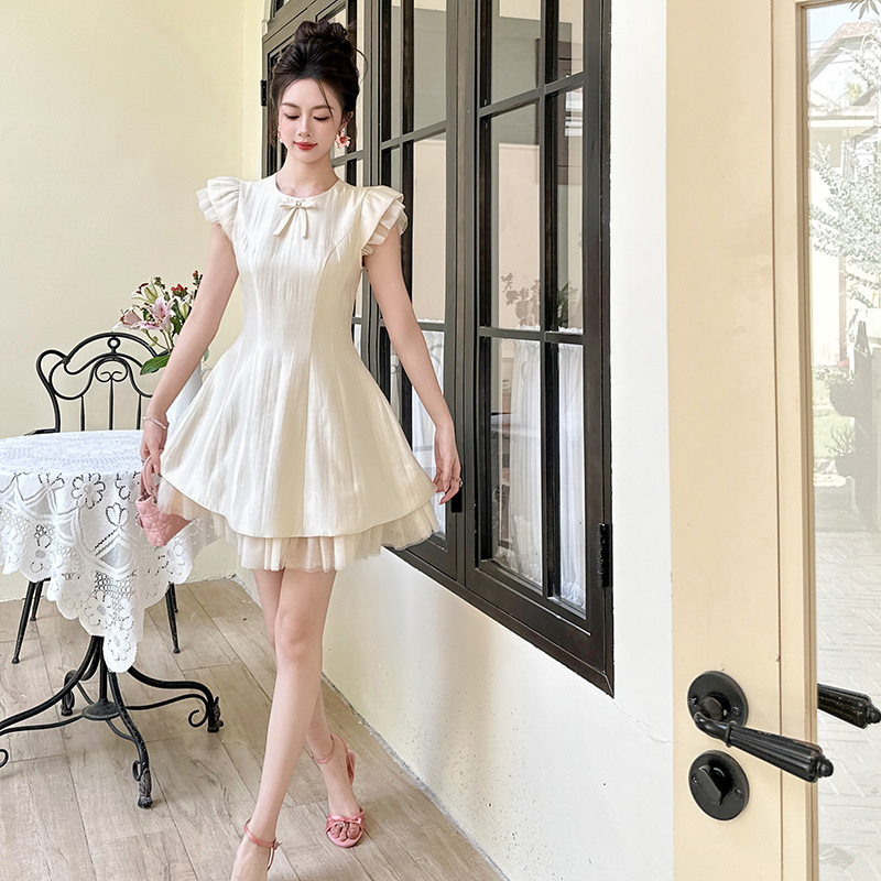 Váy chữ A phồng tay ngắn thắt eo nơ kiểu Pháp — Kem mơ