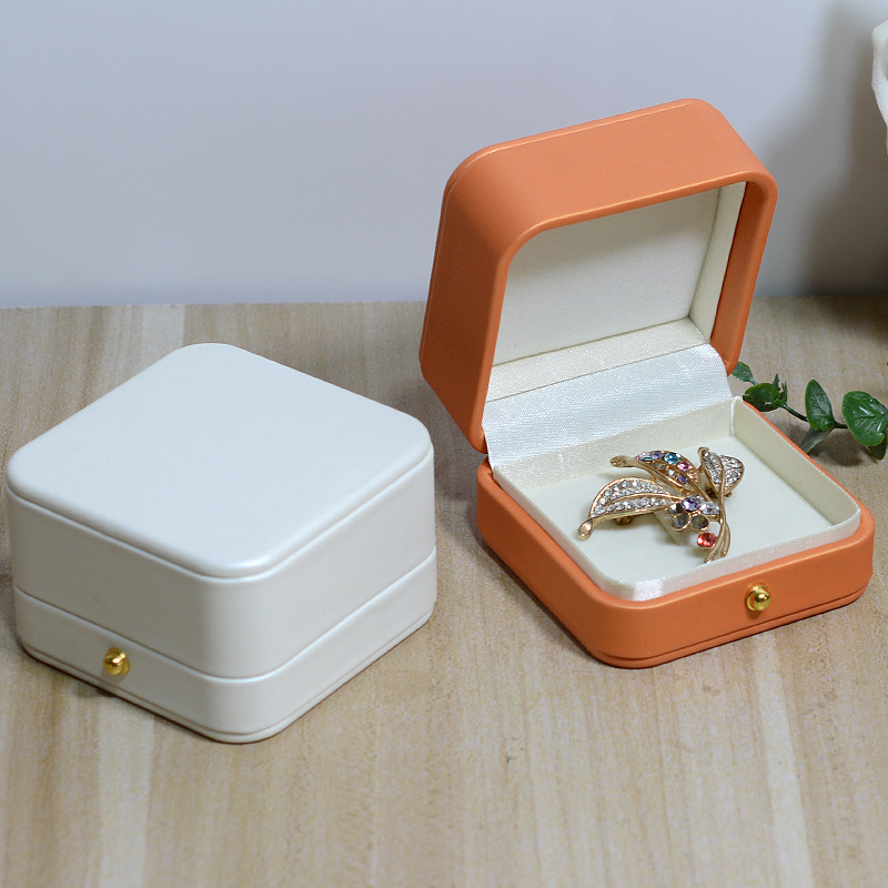 Caja de broche de botón de oro Caja de medallas Caja de embalaje de joyas Caja de anillo ancho Caja de insignia puede imprimirse en pequeñas cantidades Logo