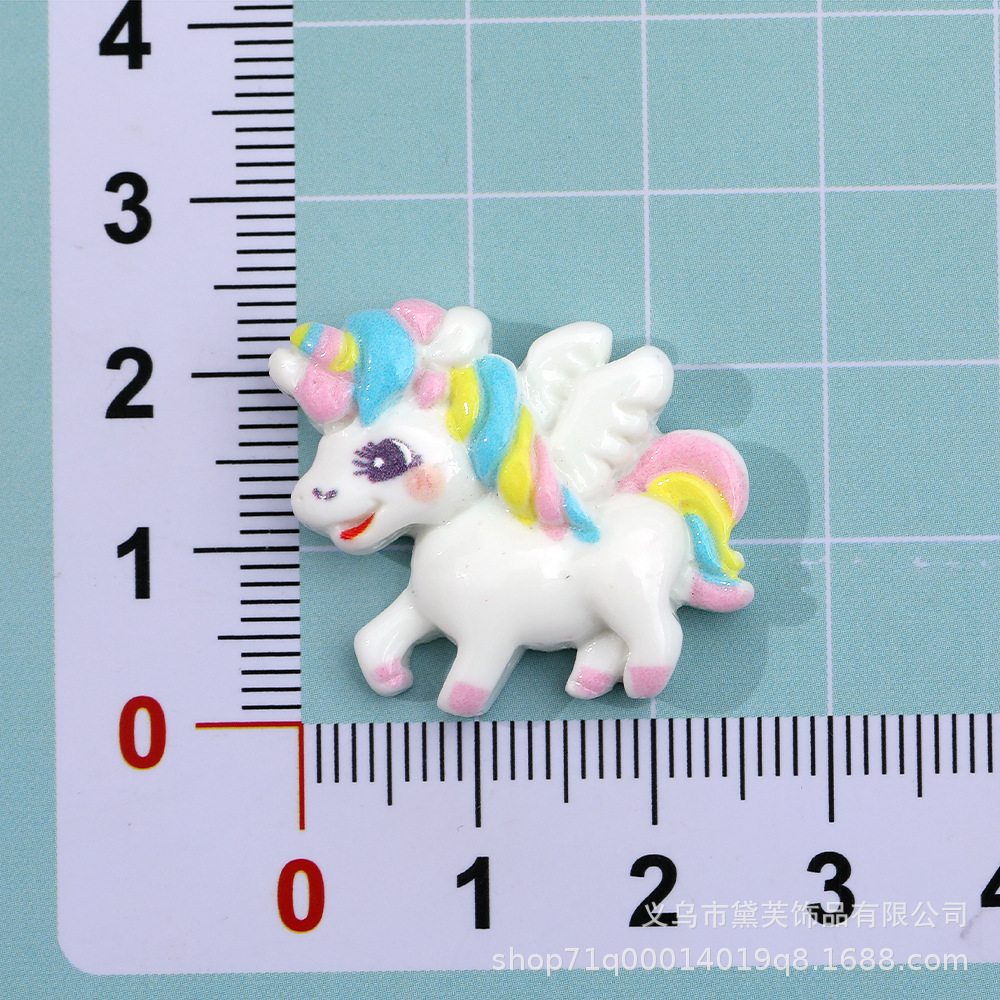 Dibujos animados Luna unicornio accesorios de resina DIY accesorios para el cabello teléfono móvil Shell papelería clave colgante hecho a mano material al por mayor