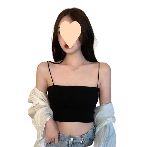 A unique, minimalist women's spaghetti strap vest designed for outerwear, featuring a one-piece, flat neckline, suitable for autumn and winter layering as a chic, stylish base top.