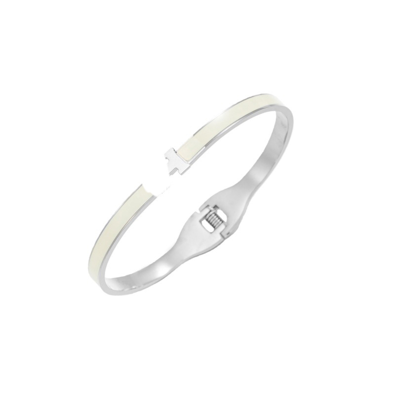 Beige bracelet with letters