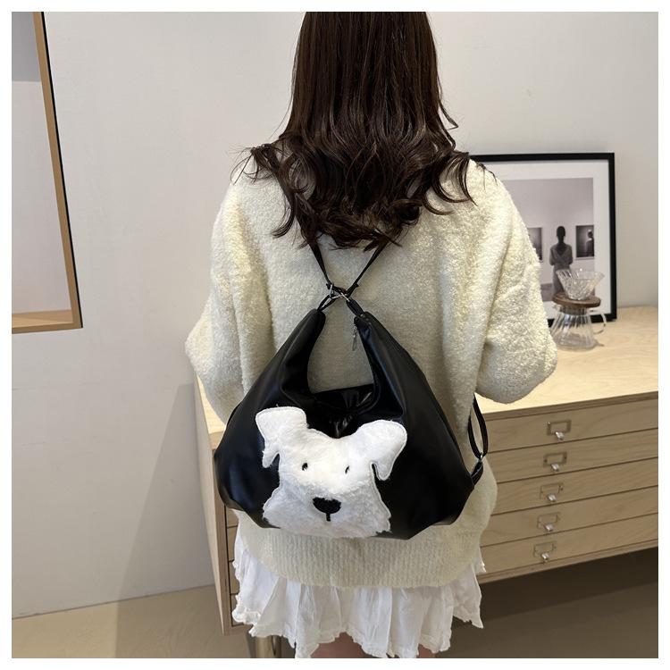 The new autumn and winter 2024 fashion cartoon backpack with simple, individual and niche design, single-shoulder bag and commuter tote bag undefined