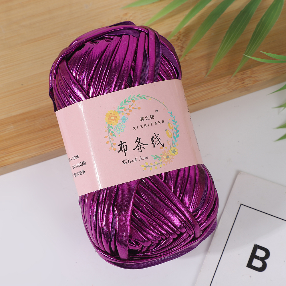 Línea textil Qian Zhi hilo de color mágico tejido a mano hilo de fantasía de color bricolaje en stock fábrica al por mayor