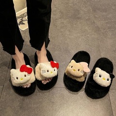 可爱いファッション特猫一字スリッパの女性モデルは、2024年秋冬の新しい厚い底に毛の高いスリッパを着ています