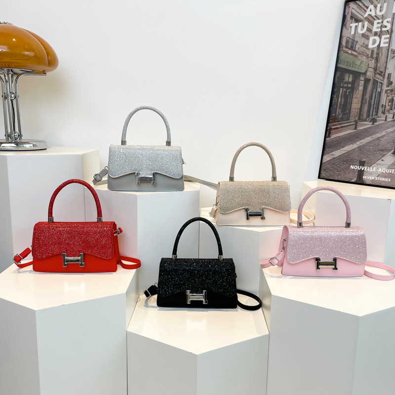 Modesta pequeña atmósfera fresca y simple bolso cuadrado de verano 2025, nueva dama sensación de estilo extranjero dulce mochila de hombro