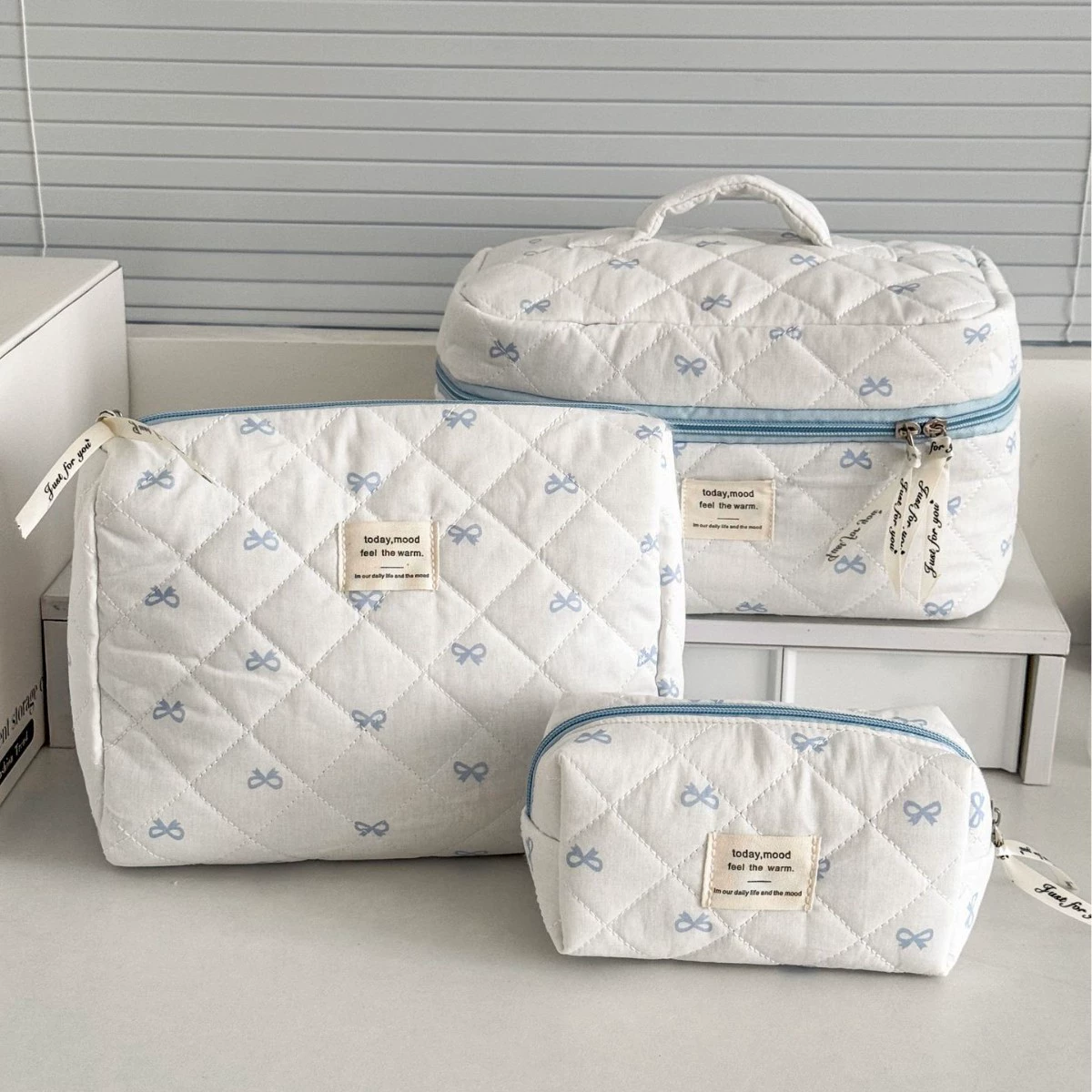 Capacious cosmetic bag with bow, handheld soft organizer bag, flowered