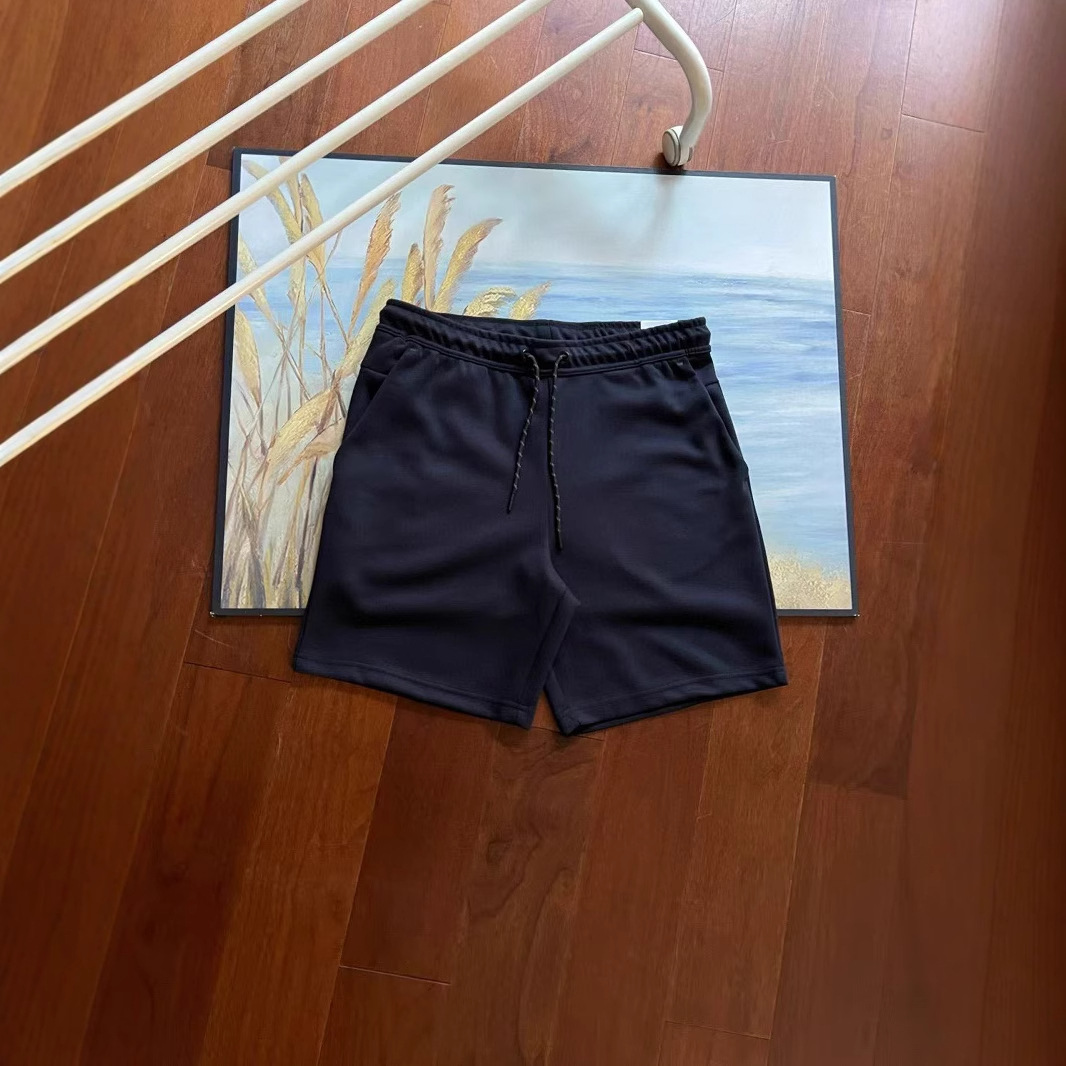 Verano nuevo estilo pequeño gancho versión en el extranjero de doce colores pantalones cortos deportivos de punto de pegamento lateral para hombres pantalones de cinco puntos 4503