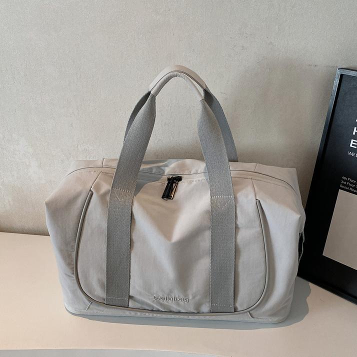 Bolso de viaje portátil coreano transfronterizo nuevo bolso de gimnasio ligero de gran capacidad bolso de viaje de viaje simple de ocio