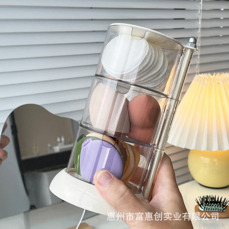 Venta directa de fábrica belleza huevo caja de almacenamiento de escritorio belleza pupila maquillaje tubo dormitorio cojín de aire puff a prueba de polvo estante de almacenamiento giratorio