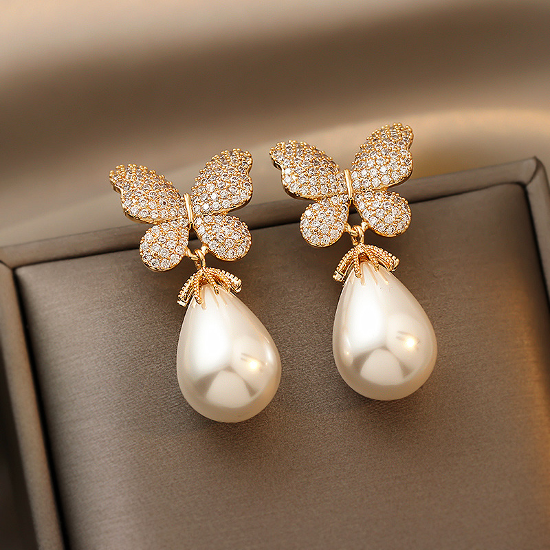Nihaojewelry Fashion Pearl Diamond Butterfly Earrings Wholesale Jewelry display picture 3