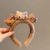 Brown three-headed kt cat