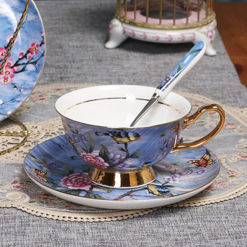 Flor y pájaro pintura oro hueso China taza de café platillo traje nuevo pequeño lujo Té taza de té
