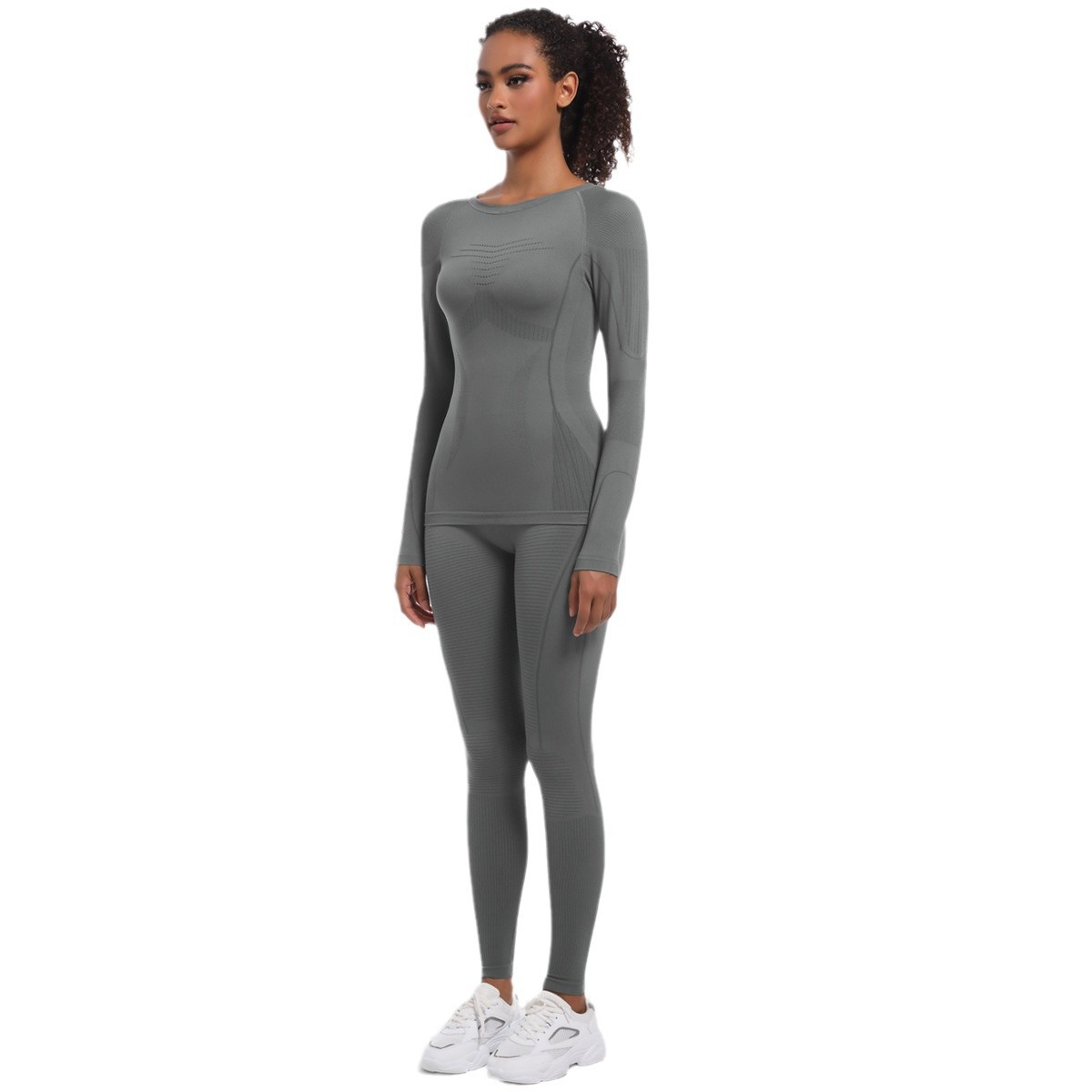 Nuevo cross-border sin costuras ajustado traje de esquí de cintura alta traje de plástico conjunto de deporte correr bicicleta manga larga ropa de yoga mujer