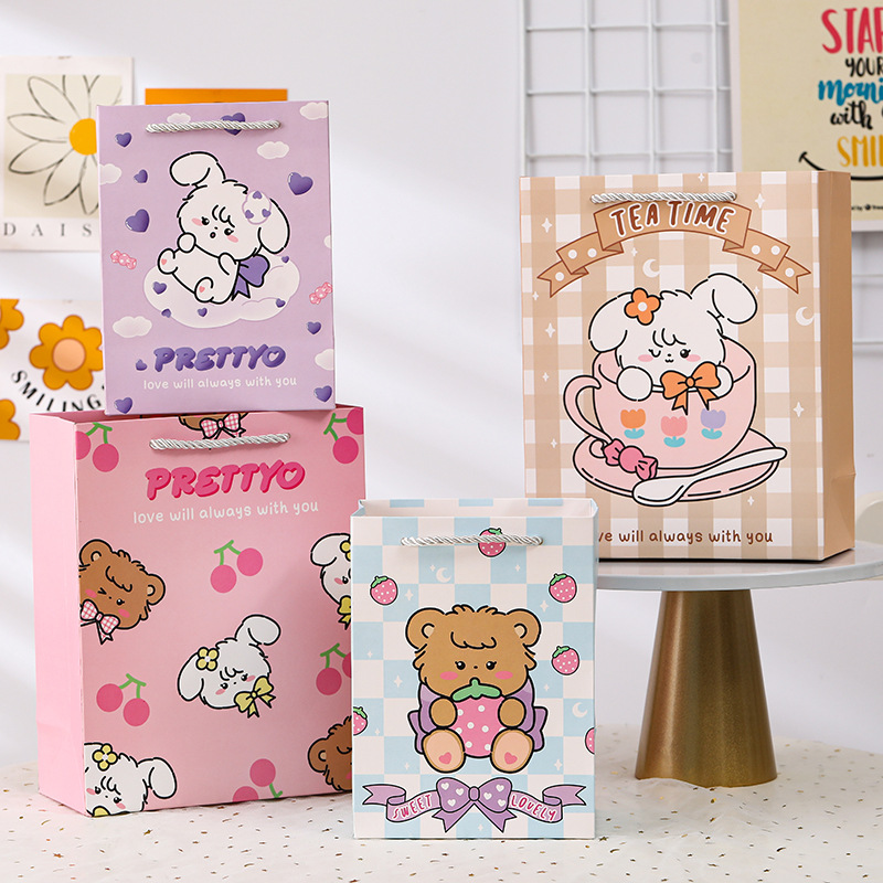 新款可愛動物禮品袋優質白卡手提袋商場購物袋卡通回禮紙袋子