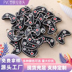 ゲーム機のファスナーの頭のメーカーの創意は服の部品の立体の柔らかいゴムの章を注文してプラスチックのPVCのプラスチックのファスナーの頭を作ります。
