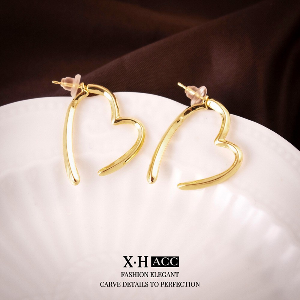 Aguja de plata de moda alta sensación de diamante de goteo de aceite pendientes nicho universal elegante pernos de orejas ligero lujoso temperamento simple orejas para mujeres