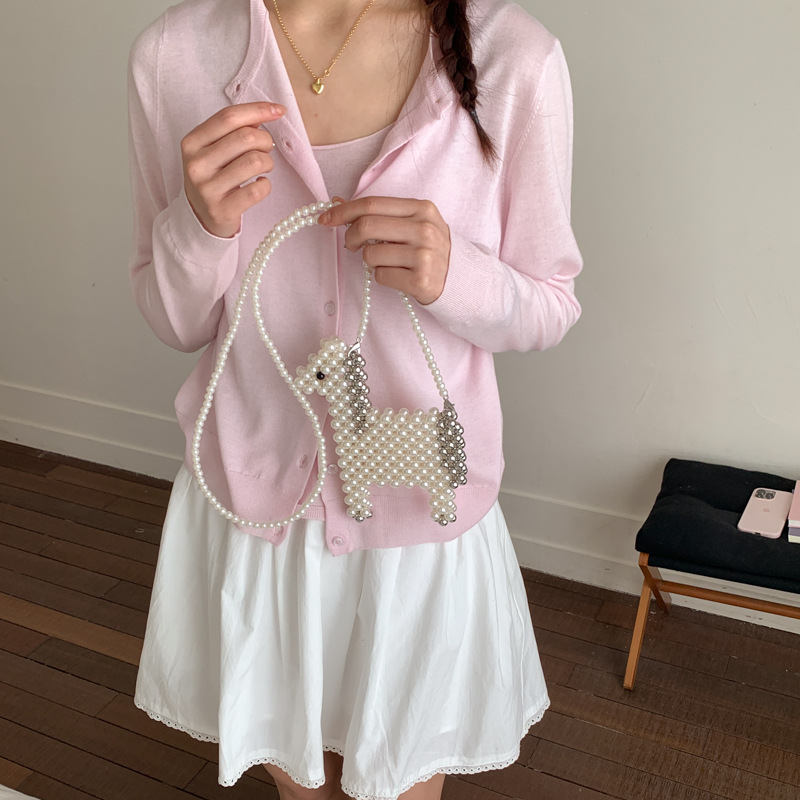 Bonita alpaca para hombres y mujeres bolsas de hombro tejidas a mano mini bolsas de perlas nuevas bolsas de accesorios para niños de comercio exterior