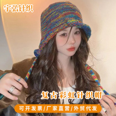 ファッション秋冬レトロ虹色ストライプ耳保護毛糸帽子子供が顔を見せています。