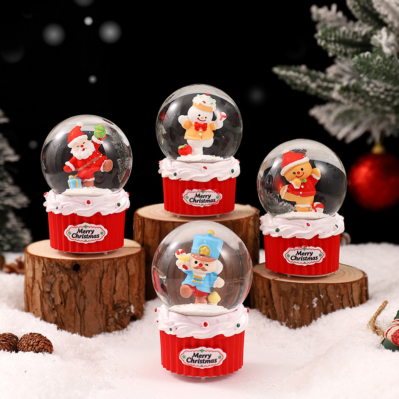 Una variedad de regalos de decoración de Navidad Navidad iluminante bola de cristal caja de música ventana diseño de velas lámparas de viento árbol de Navidad