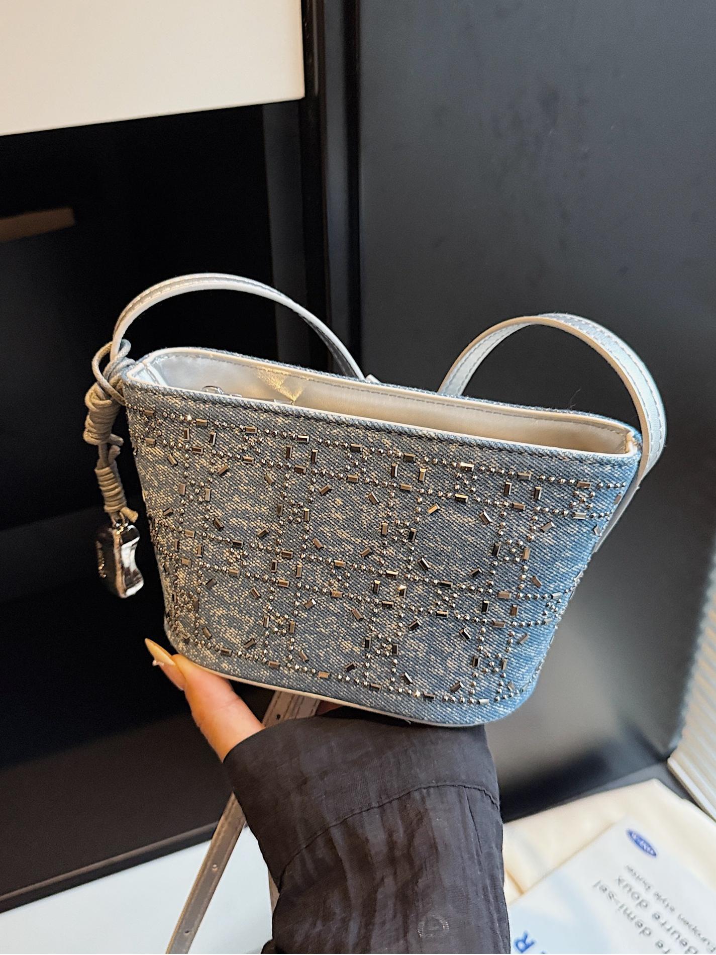 Bolsos pequeños de mezclilla populares de verano para mujer 2025 nuevo estilo estilo occidental todo fósforo moda pequeña bolsa cuadrada textura de moda bolsa de cubo