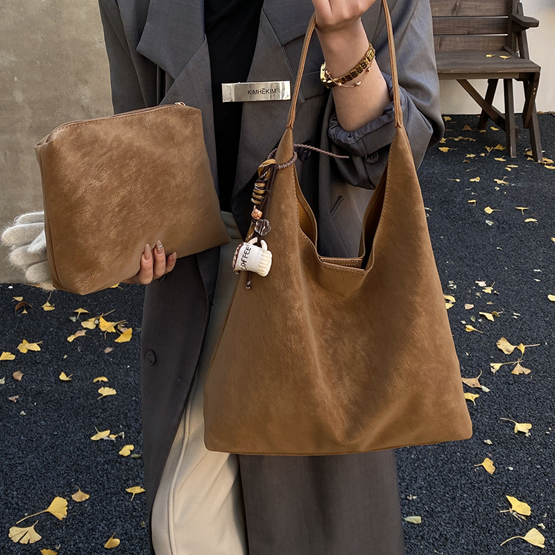 Bolsa de invierno retro de peluche para mujeres 2025, nueva bolsa de hombro universal, bolsa de viaje de gran capacidad