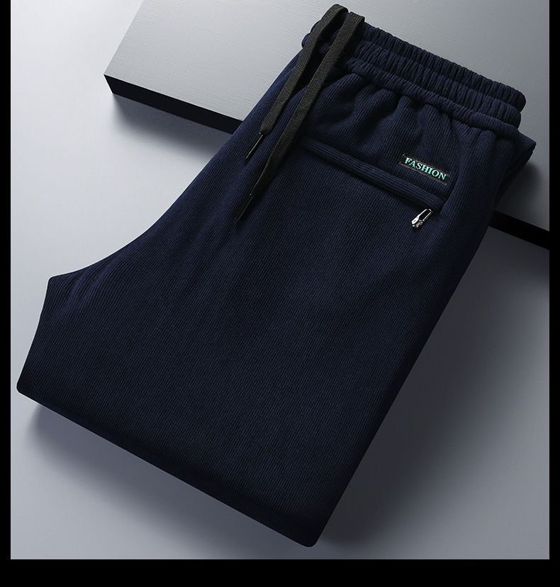 Pantalones casuales engrosados forrados de pana de invierno para hombres más tamaño Pantalones rectos de negocios de pana suelta