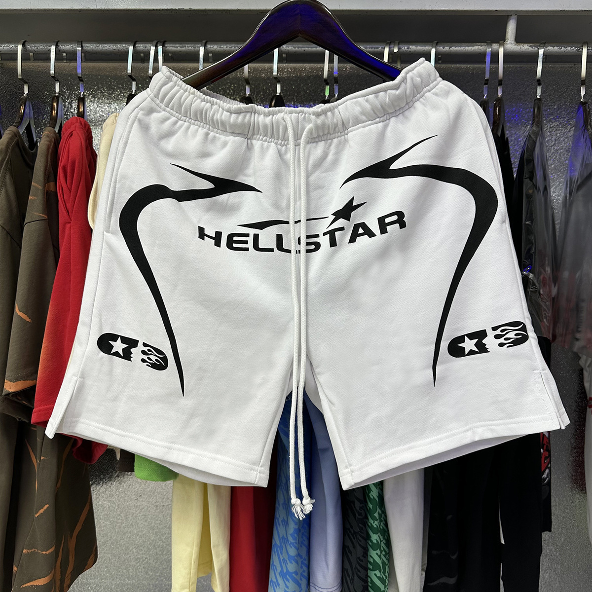 Hell Star lavando y desgastando pantalones cortos casuales 2024 verano nuevo estilo marca de moda europea y americana hip-hop pantalones de cinco puntos hombres y mujeres