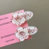 H1 pair of transparent white flowers