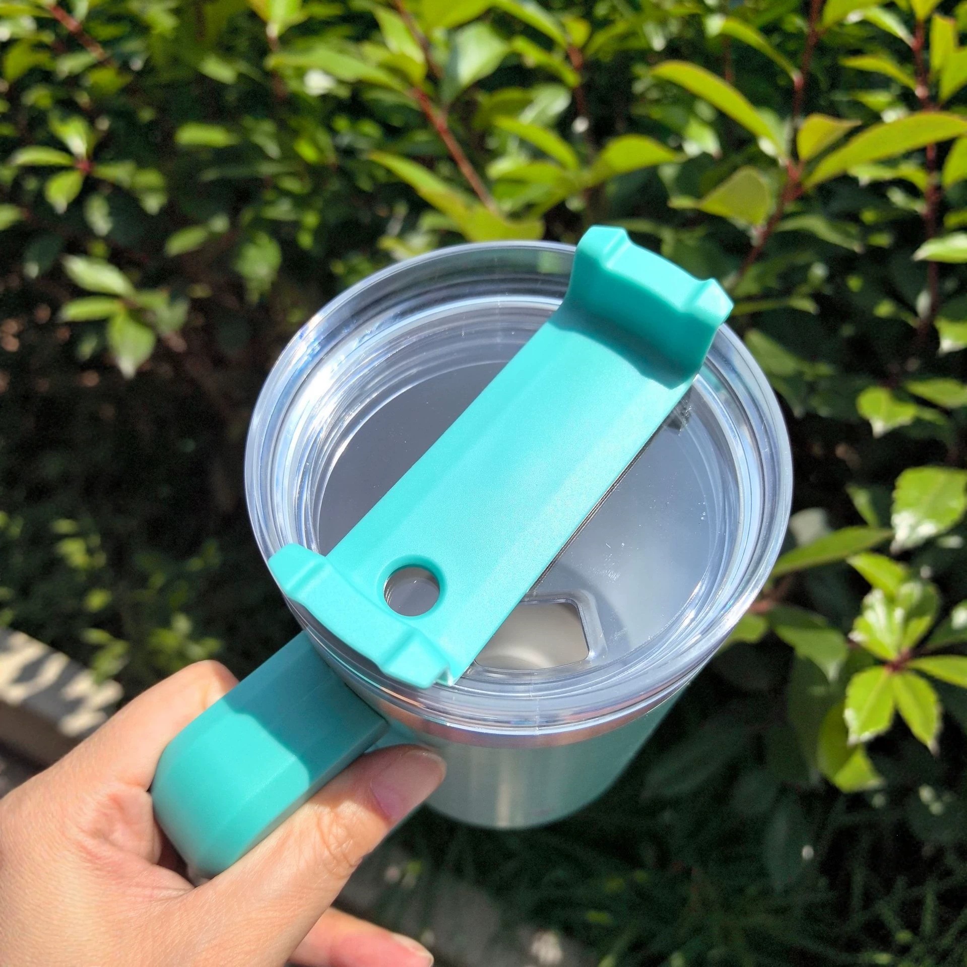 Una taza de automóvil de acero inoxidable de alta capacidad de 40 mango transfronterizo aislamiento al vacío taza de paja de automóvil taza de hielo