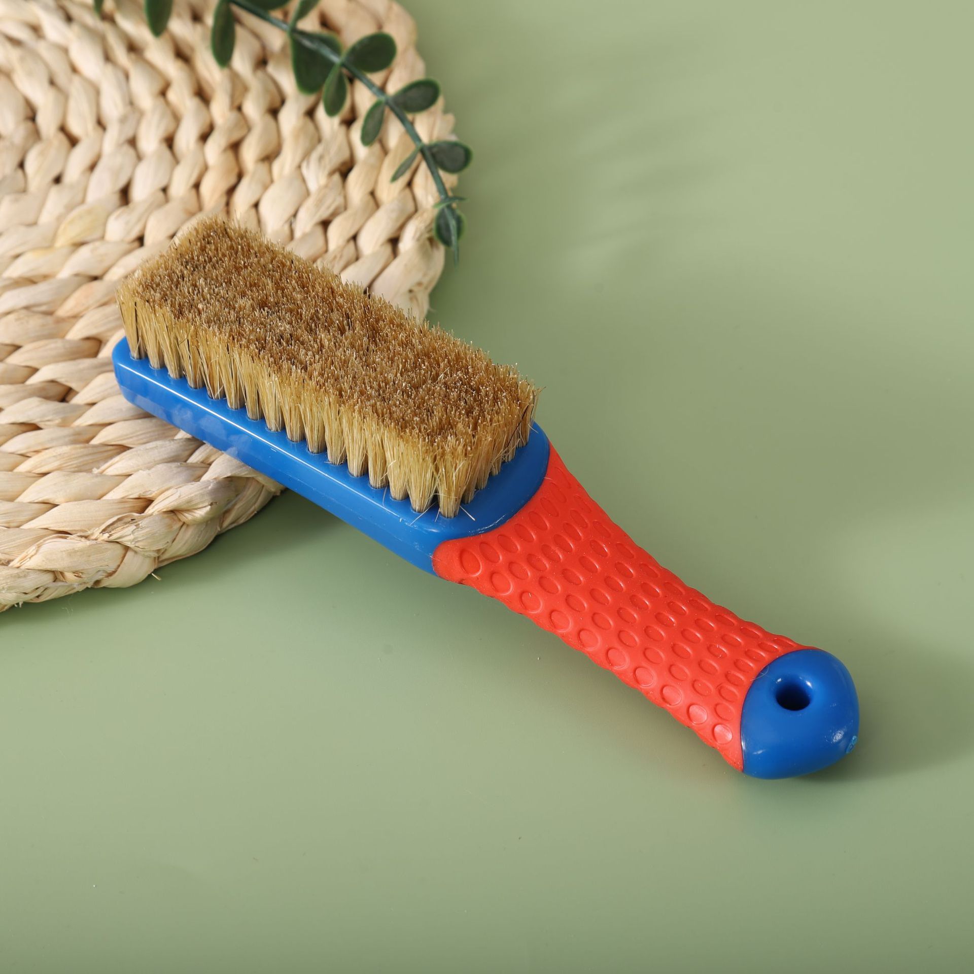 Cepillo de silicona mango azul de cerdas amarillo