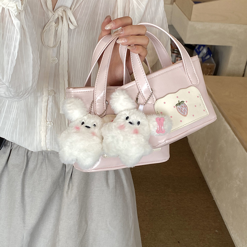 Bonita cesta de fresa pequeña bolsa de dibujos animados perros colgantes bolsas de hombro para hombres y mujeres nuevos accesorios para niños bolsas de moda coreana