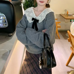 色合わせの灰色の蝶結びの手のフックの子供の襟のプルオーバーのニットの秋冬の韓国版の気質の柔らかいモチモチとした年齢のセーターの女性