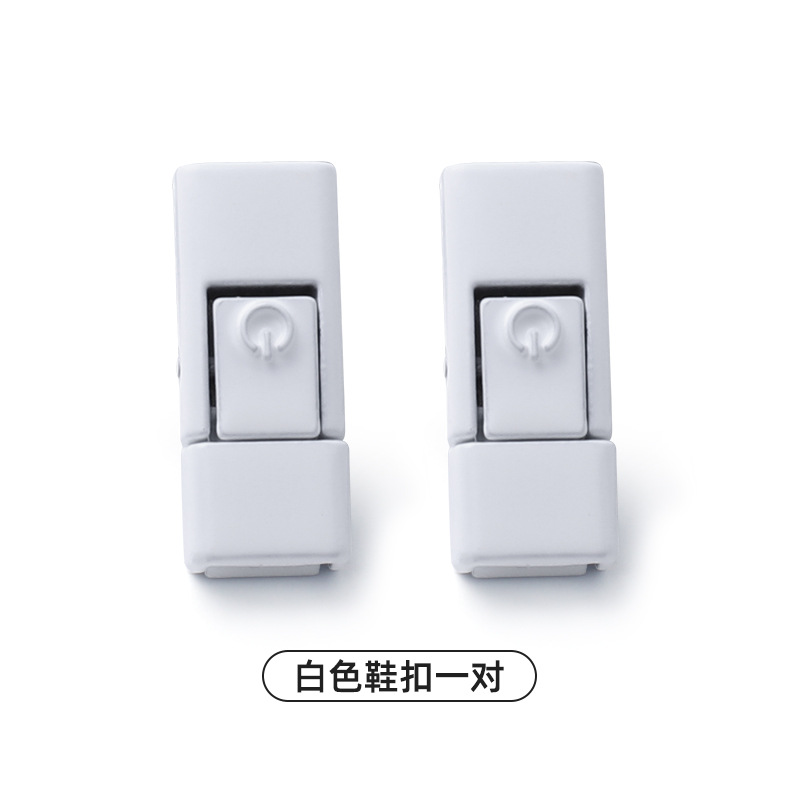 White footwear buckle