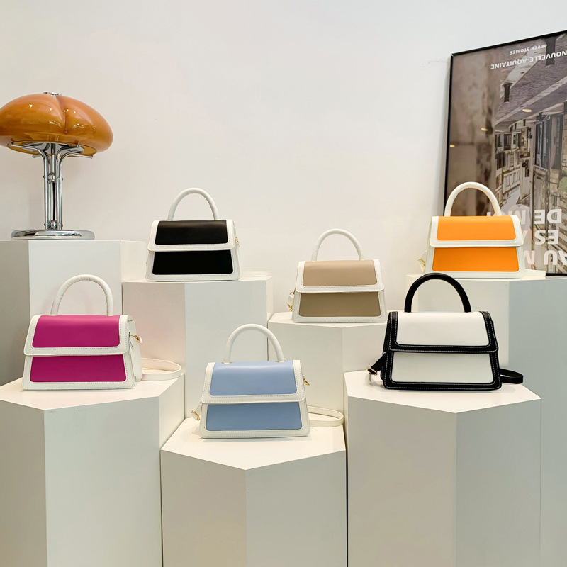 Este año bolsos populares mujeres primavera y verano versátiles 2024 nuevo mochila de hombro explosivo textura bolso de mano