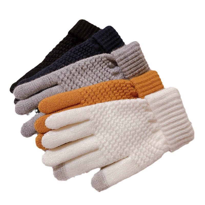 Knitted fashionable warm gloves made of faux fur, trend of season
