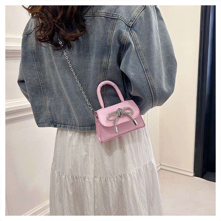 Ins niche French textured bag female 2024 new bow small square bag stylish shoulder messenger bag_voghion.com