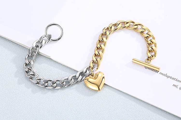 wholesale Europe and America OT buckle heart pendant stainless steel suit wholesale