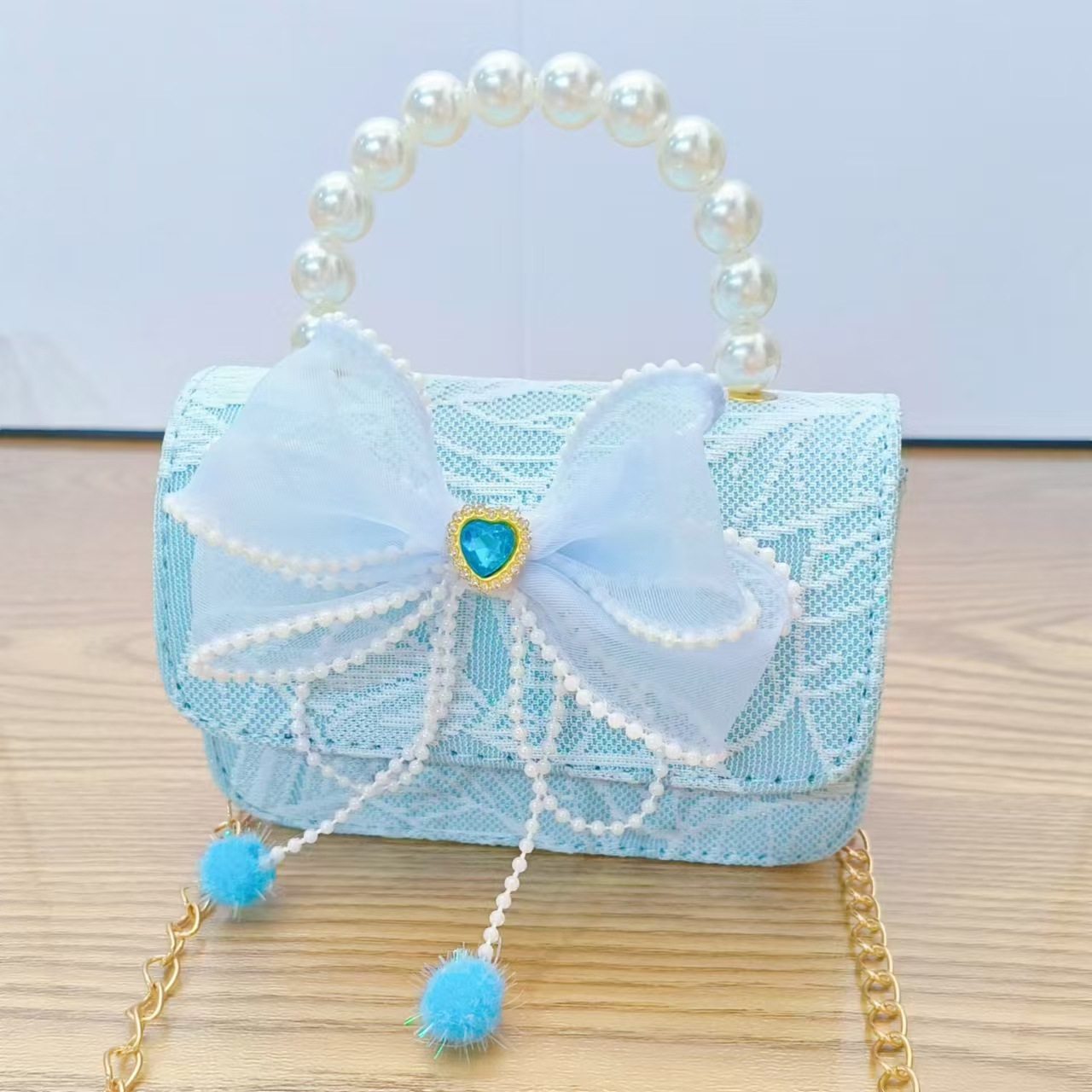 Bolso de princesa con lazo Bolso de perla Bolso de mensajero de cadena Bolso de hombro para niñas Bolso de niño con fragancia pequeña Bolso de accesorios