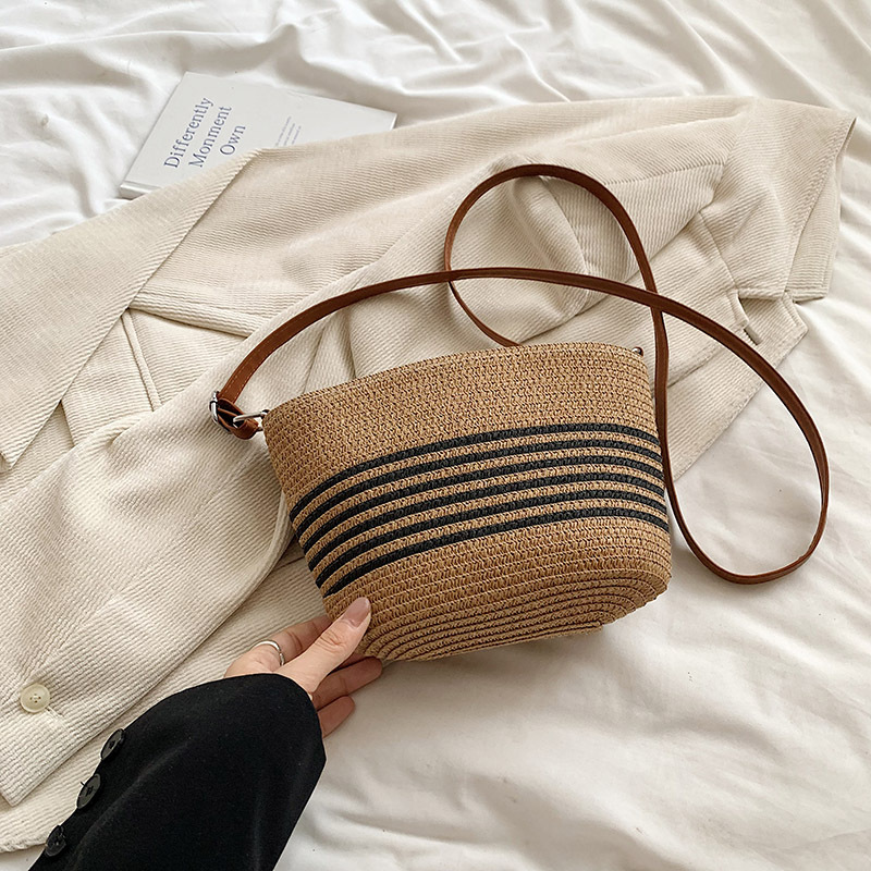 Bolsas de paja populares de verano para mujeres 2024 nuevas bolsas de vacaciones de playa de tejido casuales versátiles bolsas de balde de mochila