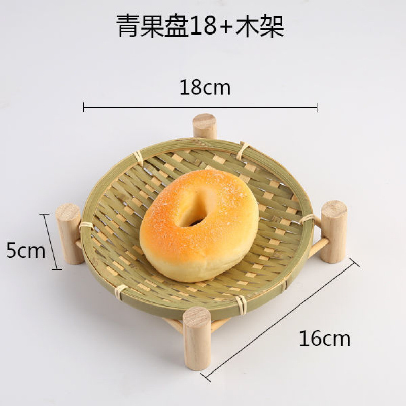 手作りの竹の編み製品の小さい竹のかごの丸い棚は箕のホテルのレストランの間食の果物のお菓子の皿のマントーのかごを振りかけます。|undefined