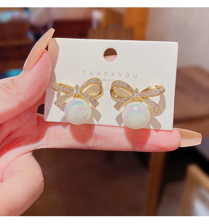 Exquisite Delicate Mermaid Pearl Inlaid Butterfly Bow Earrings display picture 3