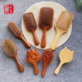 木质工艺品;经络保健器材;美发梳