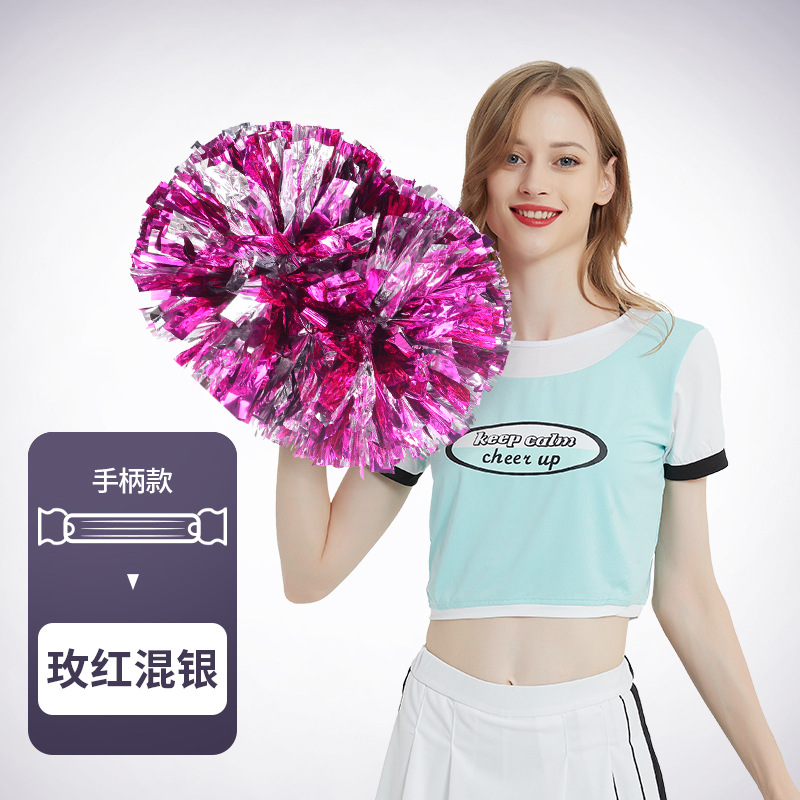 Flor bola de la flor porristas bola de la flor de la mano que sostiene la flor juegos de deportes mano que sostiene apoyos alegría apoyos en stock