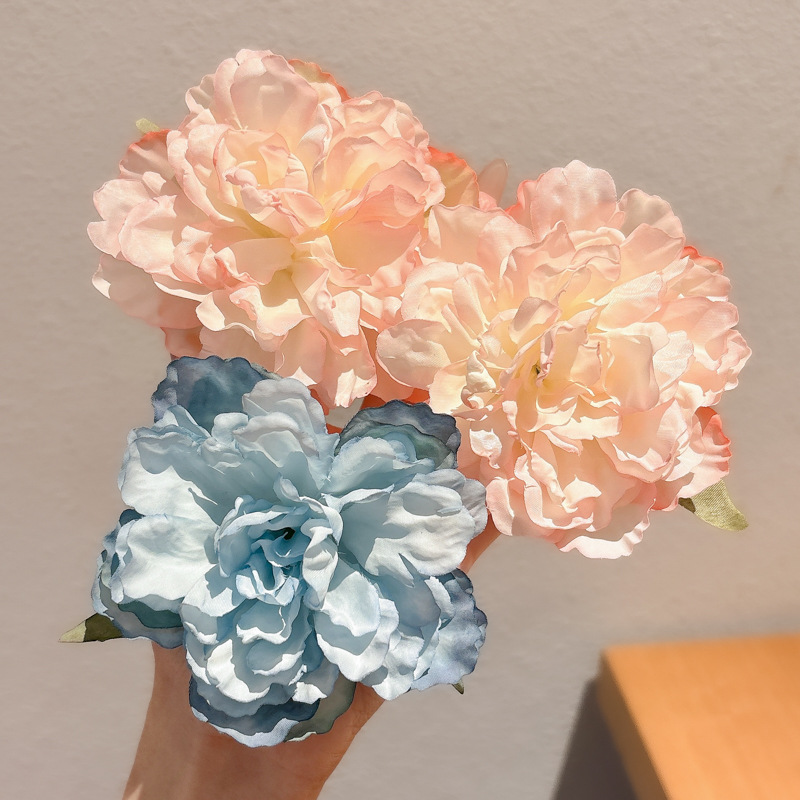 Super Fairy Flower Horquilla Lado femenino 2025 Nuevo estilo Atmósfera Clip de pico de pato con flequillo para niños Tombro de horquilla de sentido avanzado