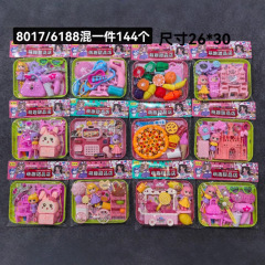 子供のままごとのおもちゃは果物の食器の調理器具を切ります。