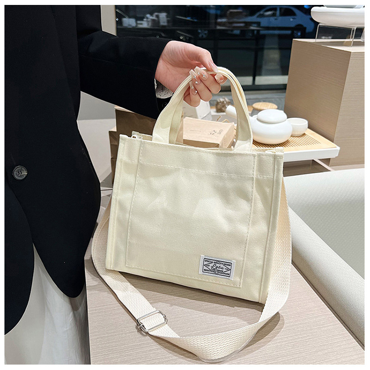 257g Weight Polyester Lining Material Sewing Thread Fashion Element Zipper Closure Type Single Shoulder Strap, Top Handle Strap Type Square Bag Bags Type Casual Occasion Canvas Material Solid Color Pattern All Seasons Season Women's Gender Streetwear Style Square Shape Women's Canvas Solid Color Streetwear Sewing Thread Square Zipper Square Bag 23