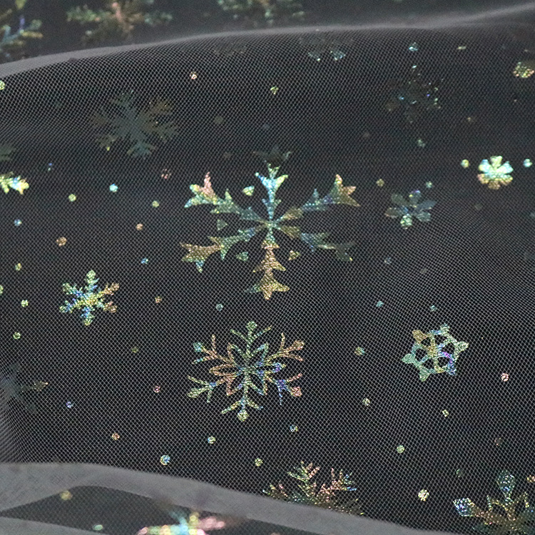 Fabricante de suministro de malla suave criptografada tela de ropa infantil flocos de nieve ropa de mujer tela de embalaje de flores DIY