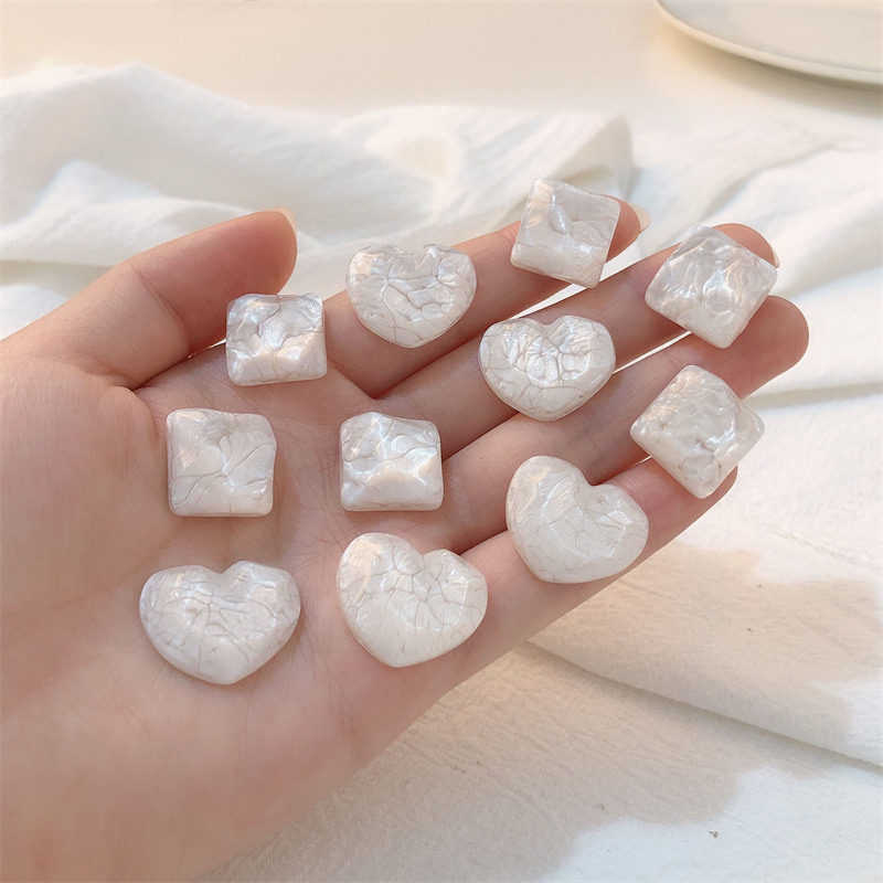 Creativa ondulación del agua en forma de flor amor corazón DIY resina dulce pendientes accesorios para el cabello teléfono móvil Shell material al por mayor