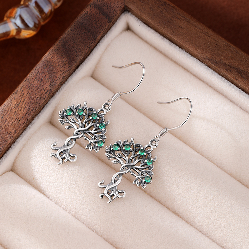 Pendientes con incrustaciones huecas de plata de ley 925 nuevos transfronterizos Pendientes INS Tree of Life Pendientes de todo fósforo retro europeo y americano femenino
