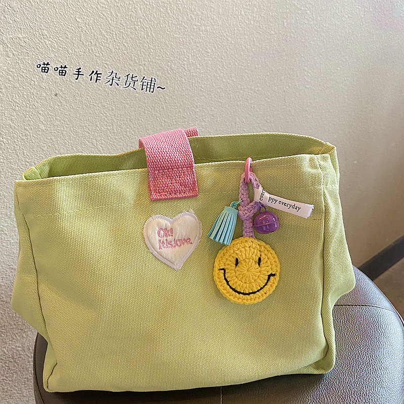 Estilo elegante GD cara sonriente sonrisa hecho a mano de lana colgante llavero bolsa decorativa dopamina accesorios producto terminado